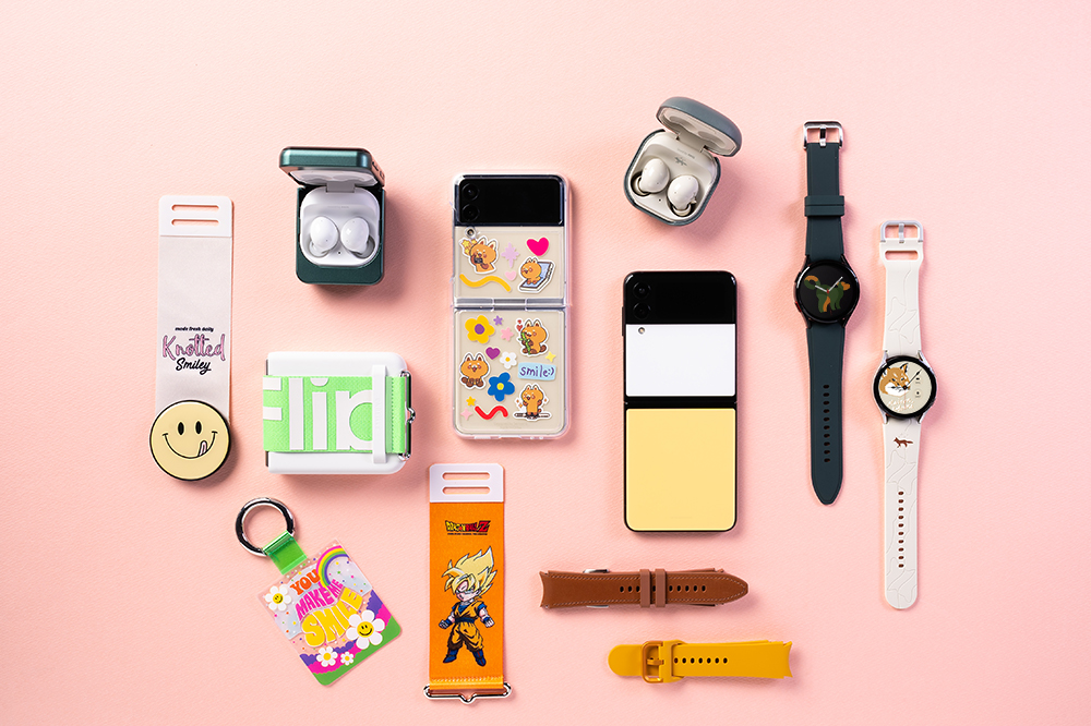 Photo of Galaxy Z Flip3 Galaxy Watch4 Galaxy Buds2 and accessories with pink background