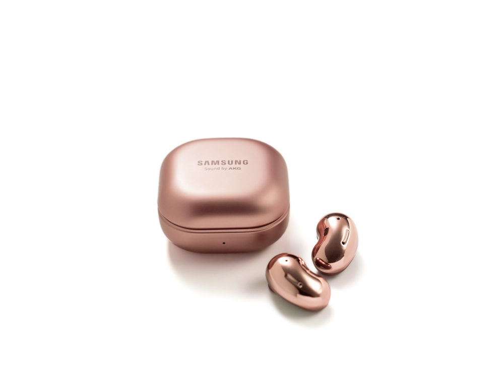 Galaxy Buds Live Mystic Bronze outside of closed case.