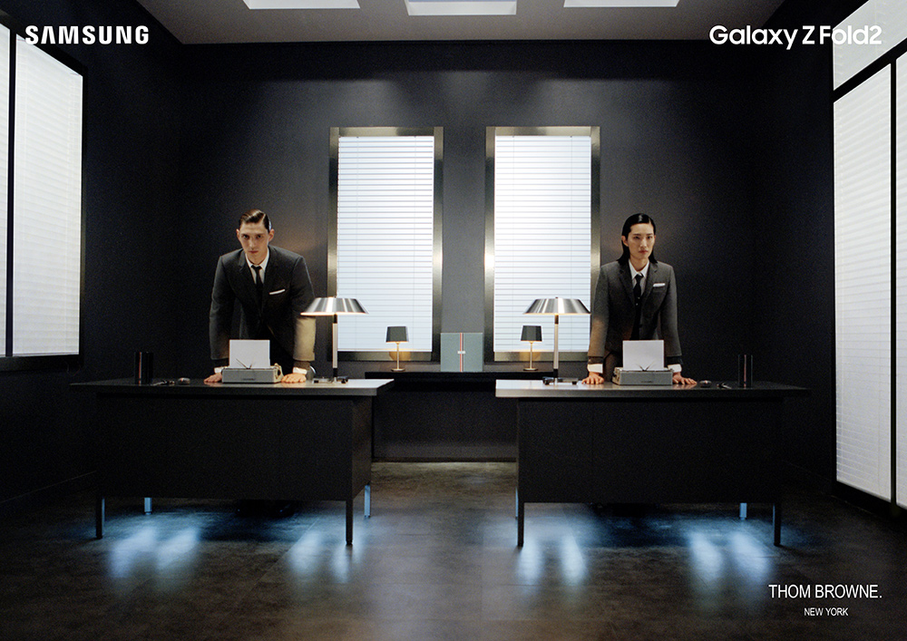 The symmetry of the Galaxy Z Fold 2 Thom Browne Edition mirroring the symmetry of a stylish office.