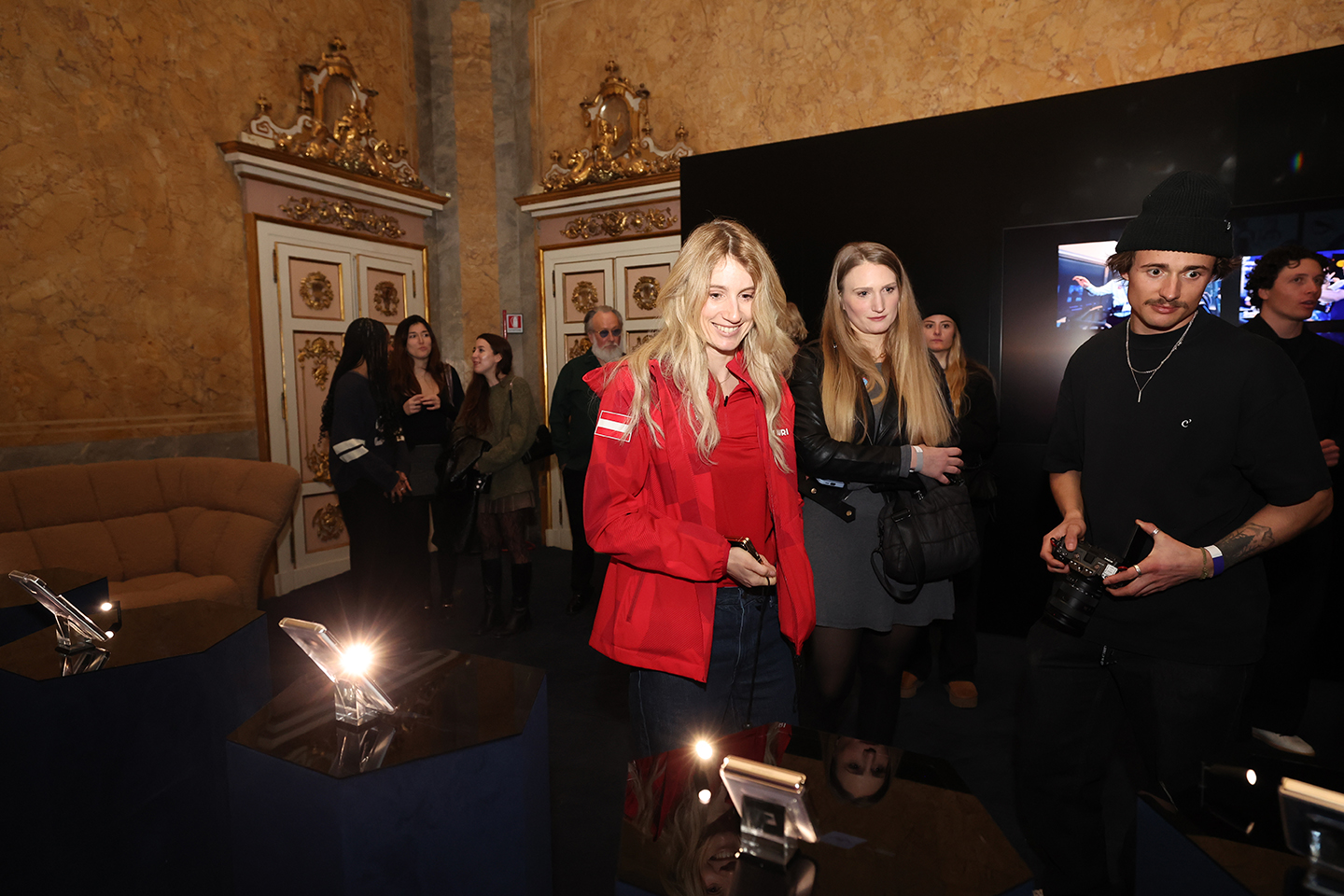 Team Samsung Galaxy athlete Anna Gasser shown smiling while touring Samsung House for the Hwaiting Night event.