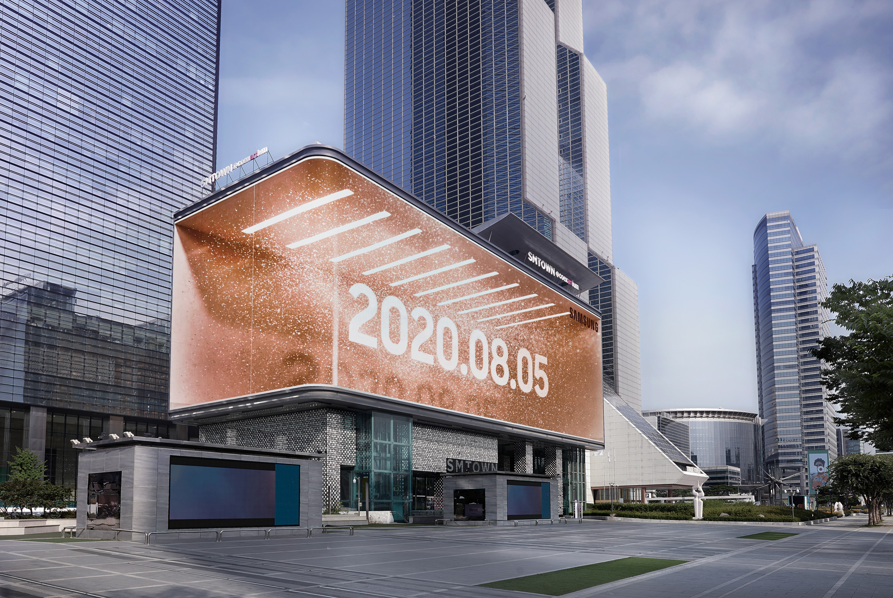 Large digital display with bronze backdrop and white letters spelling out the date August 5, 2020